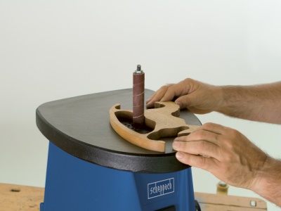 Scheppach OSM 100 - oscilační válečková bruska